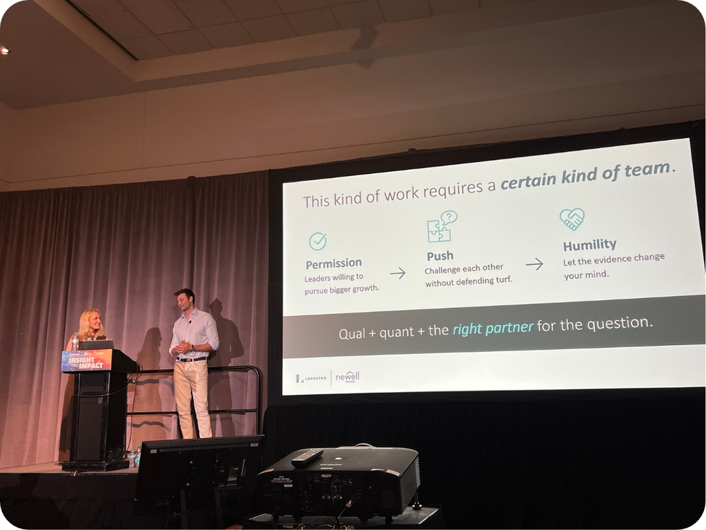 Tom Anderson and Randee Keating on stage at TMRE in Denver.